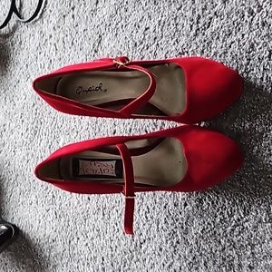 Red velvet pumps